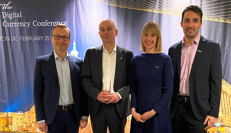Collecting the award on behalf of the partnership are, from left to right, Michael Kasch, Daniel Schwarzbach, Meri Torniainen and Michael Baur of Orell Fussli.