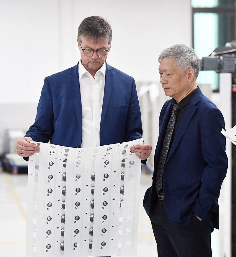 Peter Mühlfeder, Senior Executive Vice President of KURZ (left) seen here with Luong Ngoc Anh, Chairman of Q&T .